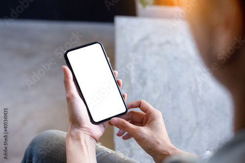 cell phone blank white screen mockup.woman hand holding texting using mobile on desk at office.background empty space for advertise.work people contact marketing business,technology