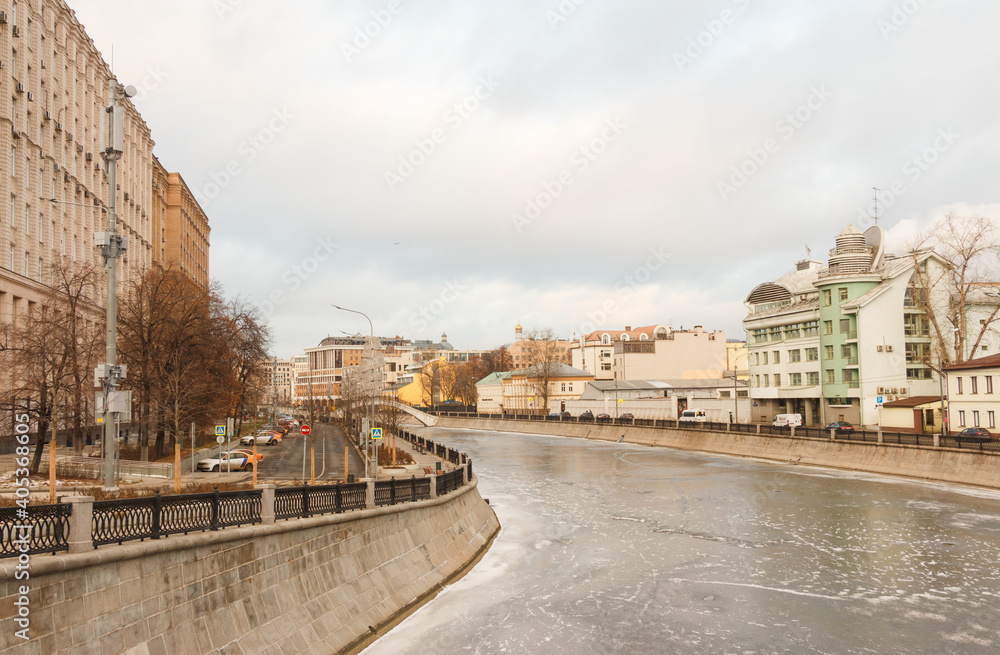 Moscow, Russia, Dec 23,2020: Embankment of frozen Vodootvodny Canal.