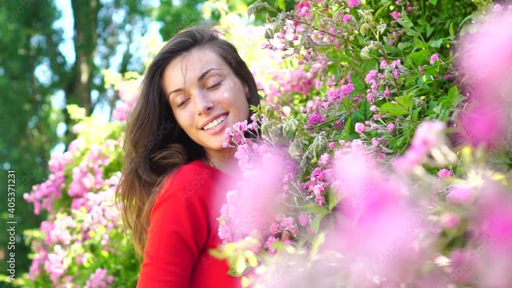Woman in flower park. Girl rose garden. Spring nature. Woman in flower park. Girl rose garden. Spring nature.