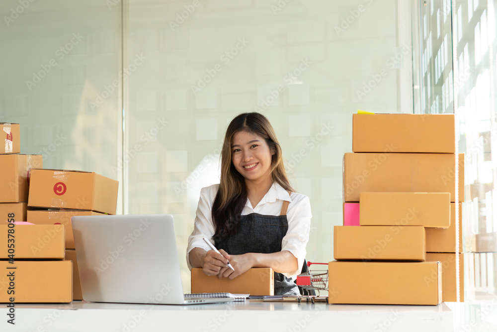 Successful Woman Entrepreneur With Parcel Boxes In Her Own Job Shopping Online Business At Home Successful Woman Entrepreneur With Parcel Boxes In Her Own Job Shopping Online Business At Home
