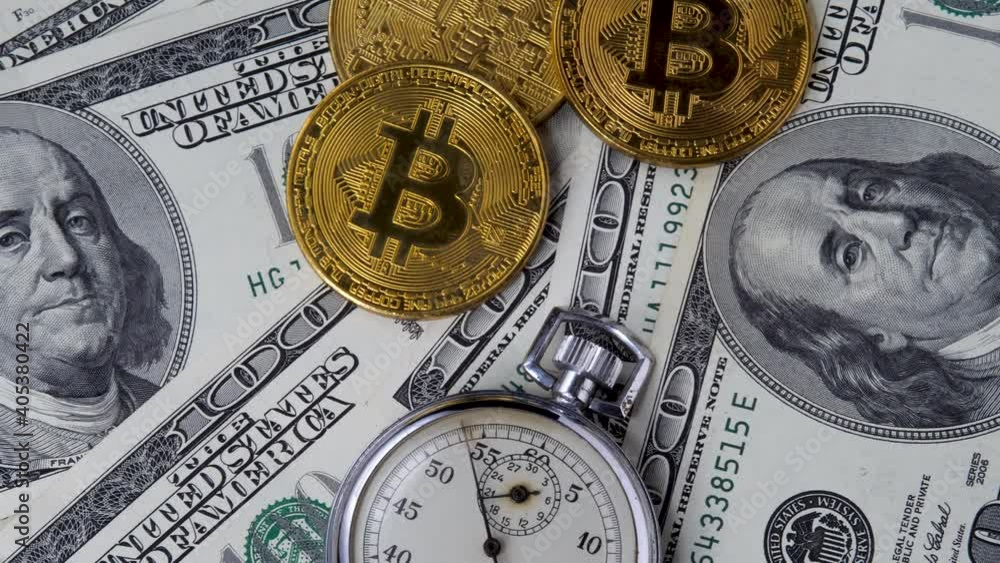 Bitcoin soared to record high against dollar boosted by increased demand from both institutional and retail investors. Metal stopwatch counts time. Money or cash revenue. Cryptocurrency, trade concept Bitcoin soared to record high against dollar boosted by increased demand from both institutional and retail investors. Metal stopwatch counts time. Money or cash revenue. Cryptocurrency, trade concept