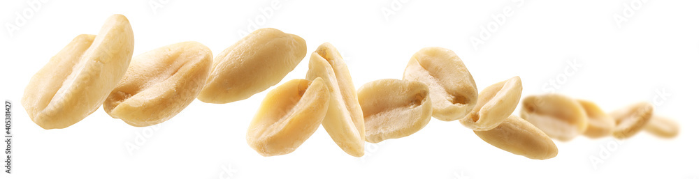 Peeled peanuts levitate on a white background Peeled peanuts levitate on a white background
