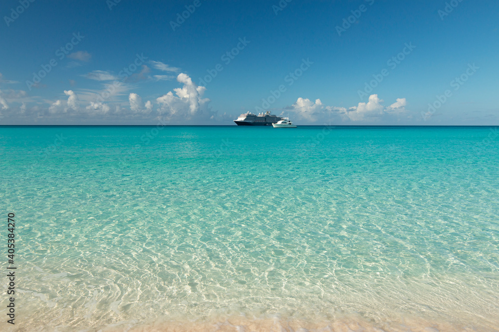 Cruise ship in the water on a tropical island