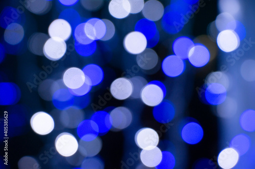 Abstract blue bokeh texture on black background