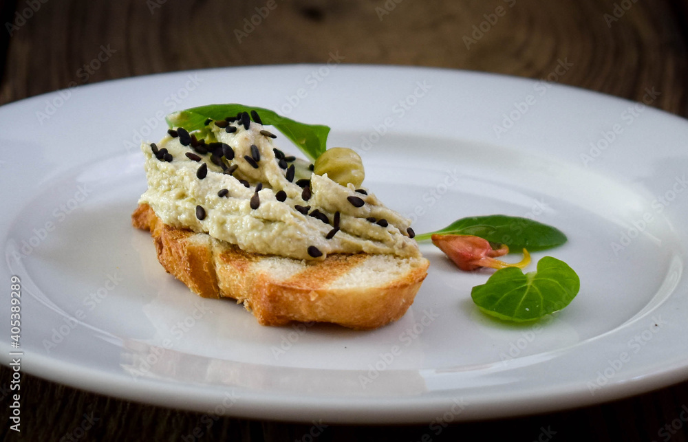 Spread of fish and cheese on a toast Spread of fish and cheese on a toast