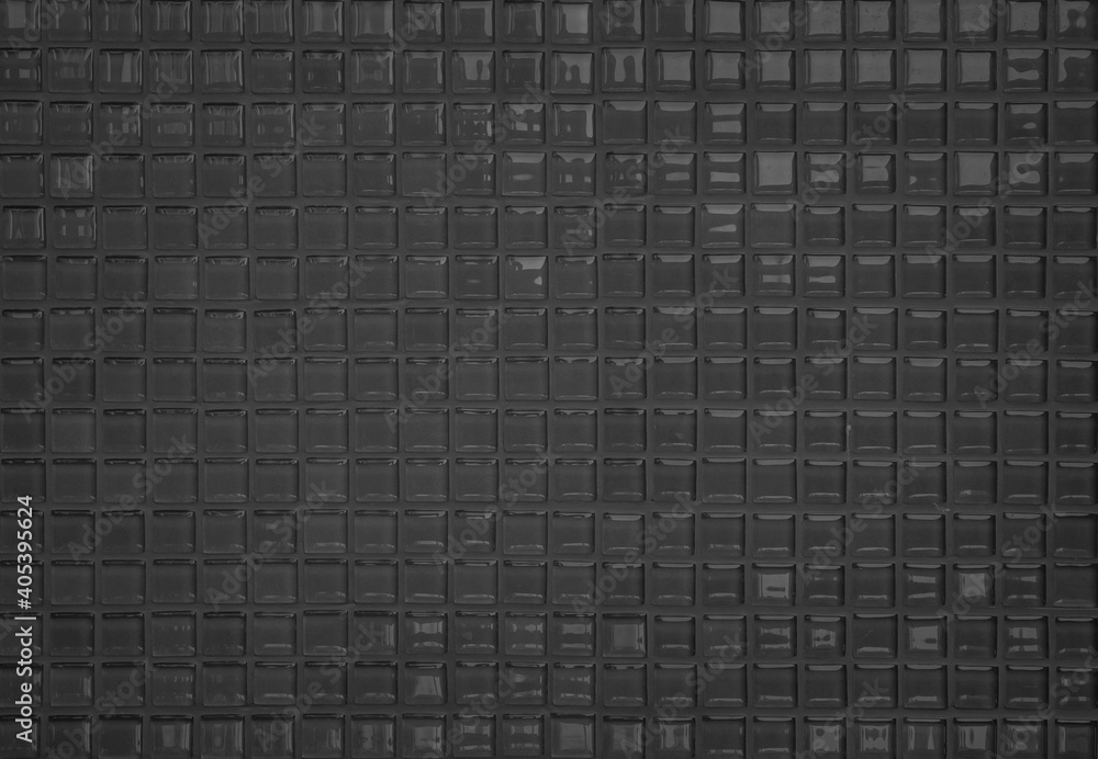 Black tile wall high resolution real photo or brick seamless pattern and texture interior room background. Dark grid tiles wall texture for the decoration of the bedroom, Home or office backdrop. Black tile wall high resolution real photo or brick seamless pattern and texture interior room background. Dark grid tiles wall texture for the decoration of the bedroom, Home or office backdrop.