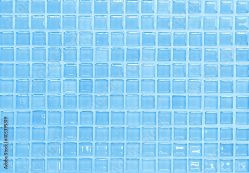 Blue pastel ceramic wall and floor tiles abstract background. Design geometric mosaic texture decoration of the bedroom. Simple seamless pattern for backdrop advertising banner poster or web.
