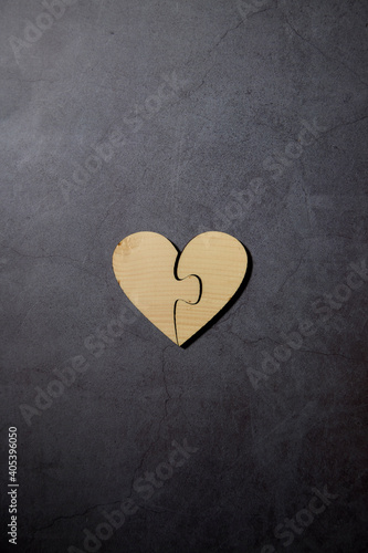 heart and wooden blocks with words In Love