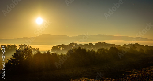 Wallpaper Mural Misty sunrise over the mountains Torontodigital.ca