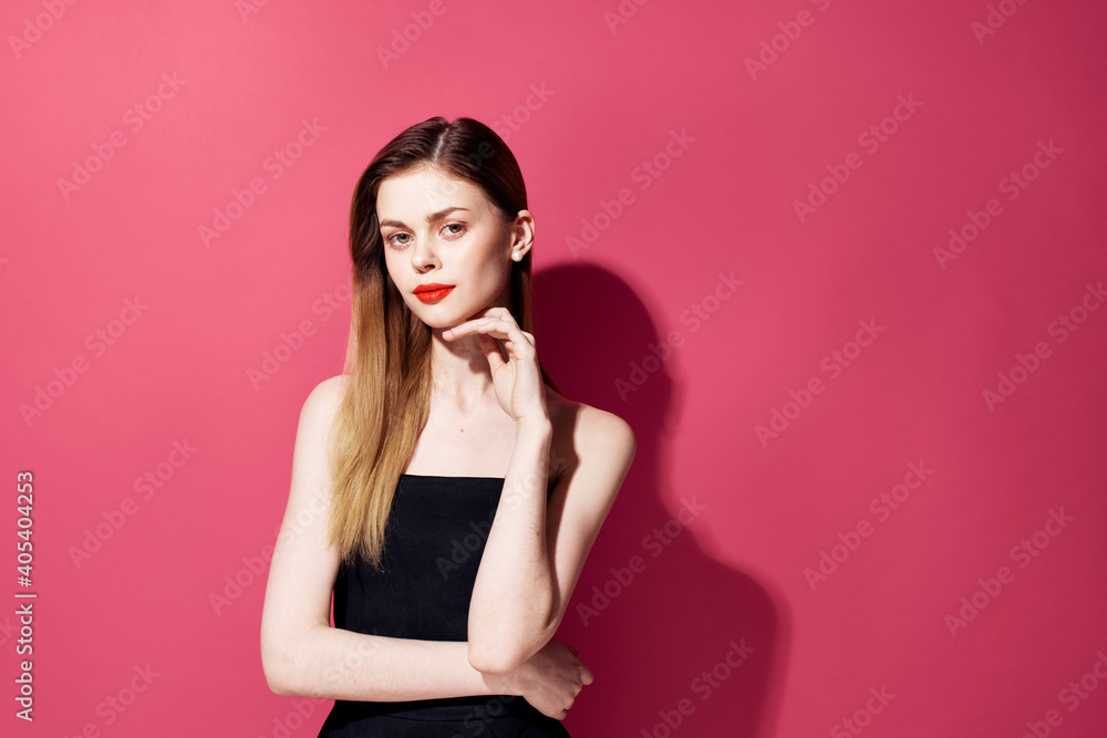 Elegant woman black cap model lifestyle pink background Elegant woman black cap model lifestyle pink background