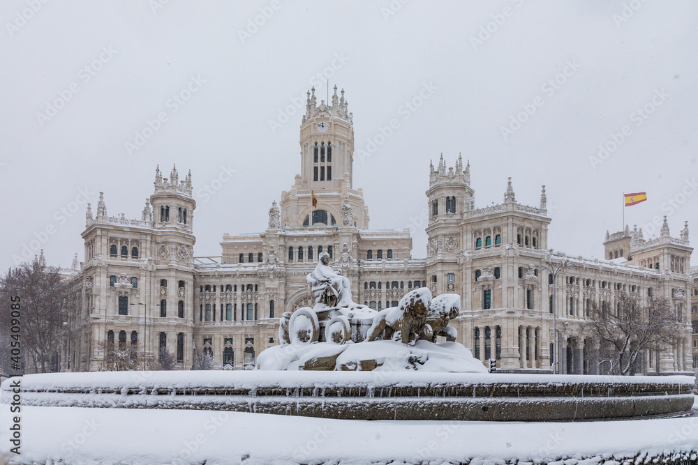 people enjoying the streets of snow, in the city of Madrid, covered by the storm philomena