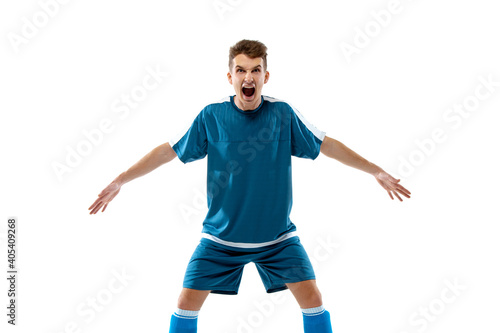 Flying. Funny emotions of professional soccer player isolated on white studio background. Copyspace for ad. Excitement in game, human emotions, facial expression and passion with sport concept.