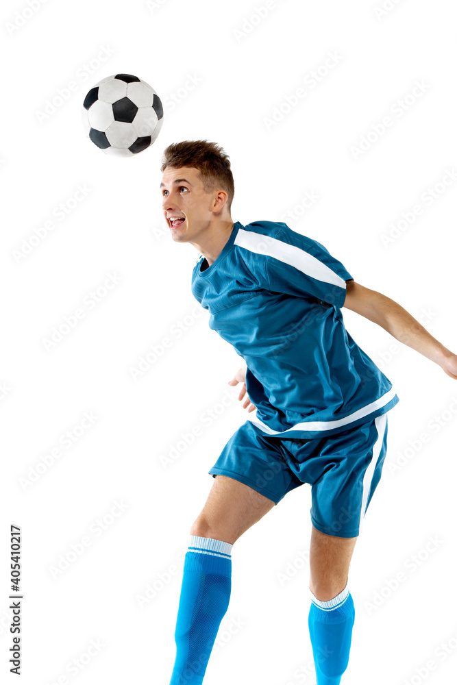 Kick. Funny emotions of professional soccer player isolated on white studio background. Copyspace for ad. Excitement in game, human emotions, facial expression and passion with sport concept.