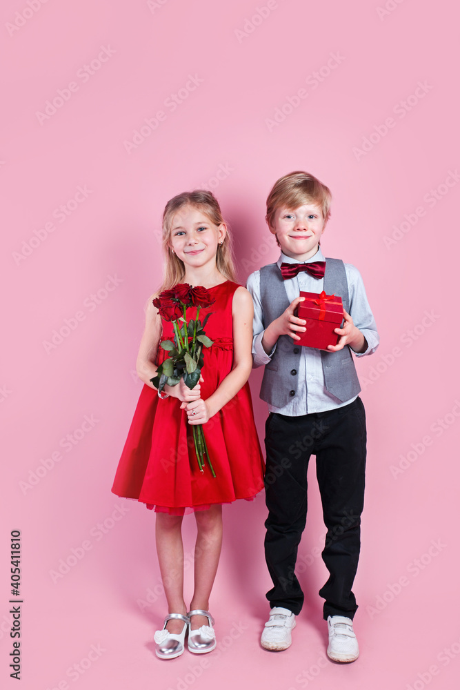 Valentines day surprise. Little boy in love giving cute girl red rose , Valentines day surprise. Little boy in love giving cute girl red rose ,
