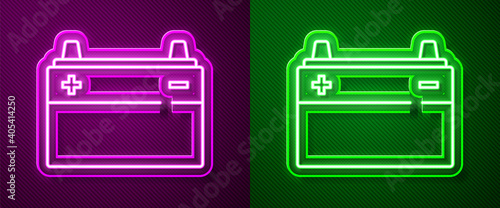 Glowing neon line Car battery icon isolated on purple and green background. Accumulator battery energy power and electricity accumulator battery. Vector.