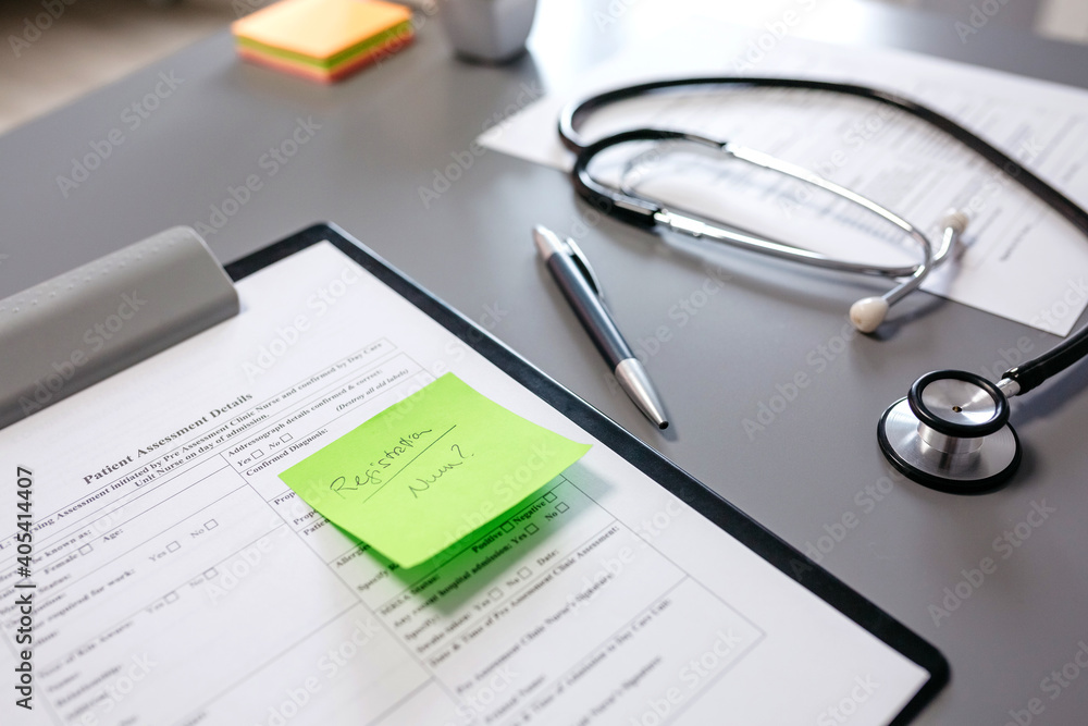 Doctor desk with medical documents and stethoscope Doctor desk with medical documents and stethoscope