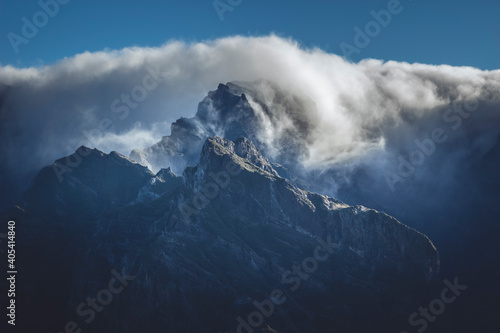 Mountain top under the clouds, view during hike on the top of Pico Grande © Vanek_photo