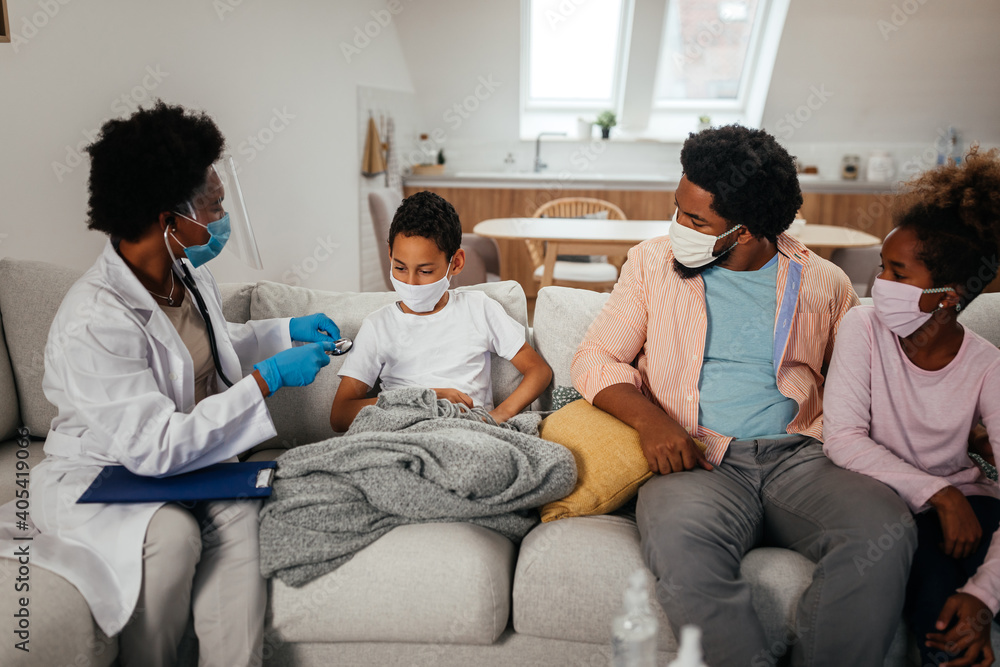 Healthcare worker at home visit during examination Healthcare worker at home visit during examination