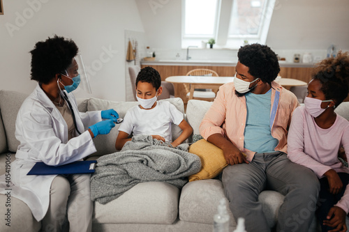 Healthcare worker at home visit during examination