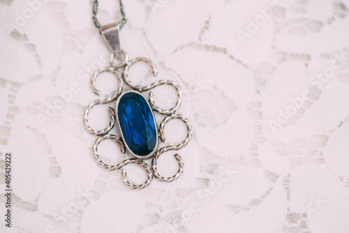 Beautiful pendent with blue stone. 