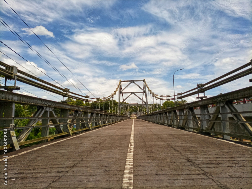 the charm of the kaliprogo bridge during the day