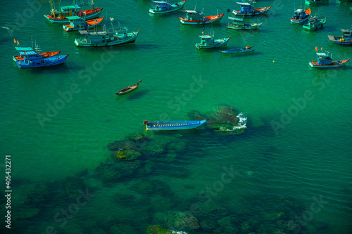 Aerial view of traditional fishermen boats lined in An Thoi harbor of Duong Dong town in the popular Phu Quoc island, Vietnam, Asia.