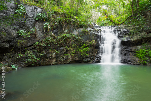Fototapeta Naklejka Na Ścianę i Meble -  Ton Rak Sai Waterfall is in Namtok Sam Lan National Park ,Saraburi Thailand