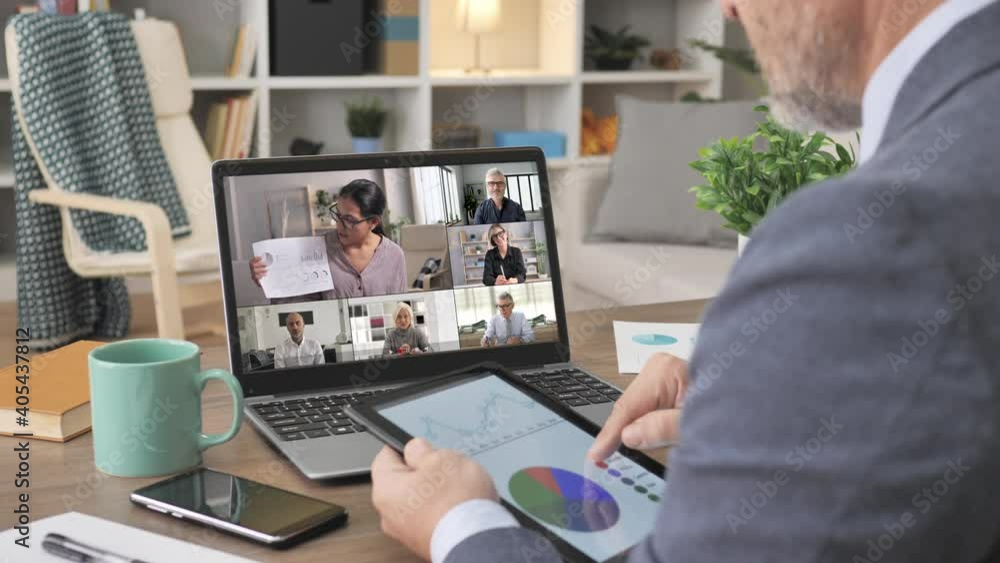business people talking in video call conference using computer app,back view of a man sharing sale report to group of colleagues during an online meeting on laptop screen,remote working from home business people talking in video call conference using computer app,back view of a man sharing sale report to group of colleagues during an online meeting on laptop screen,remote working from home
