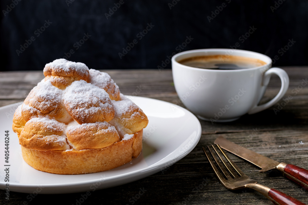 cup of coffee and cake on wooden table cup of coffee and cake on wooden table