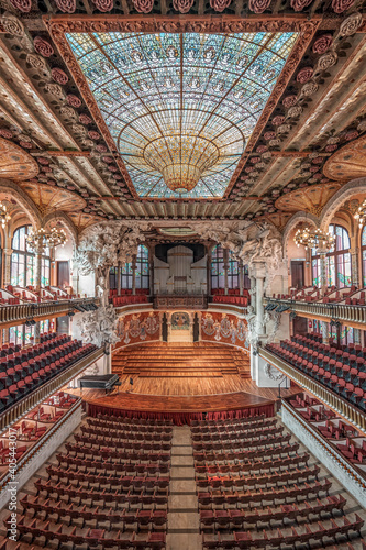 Barcelona, Spain - Feb 24, 2020: Balcony view of stained glass ceiling in Catalonia Music Hall photo