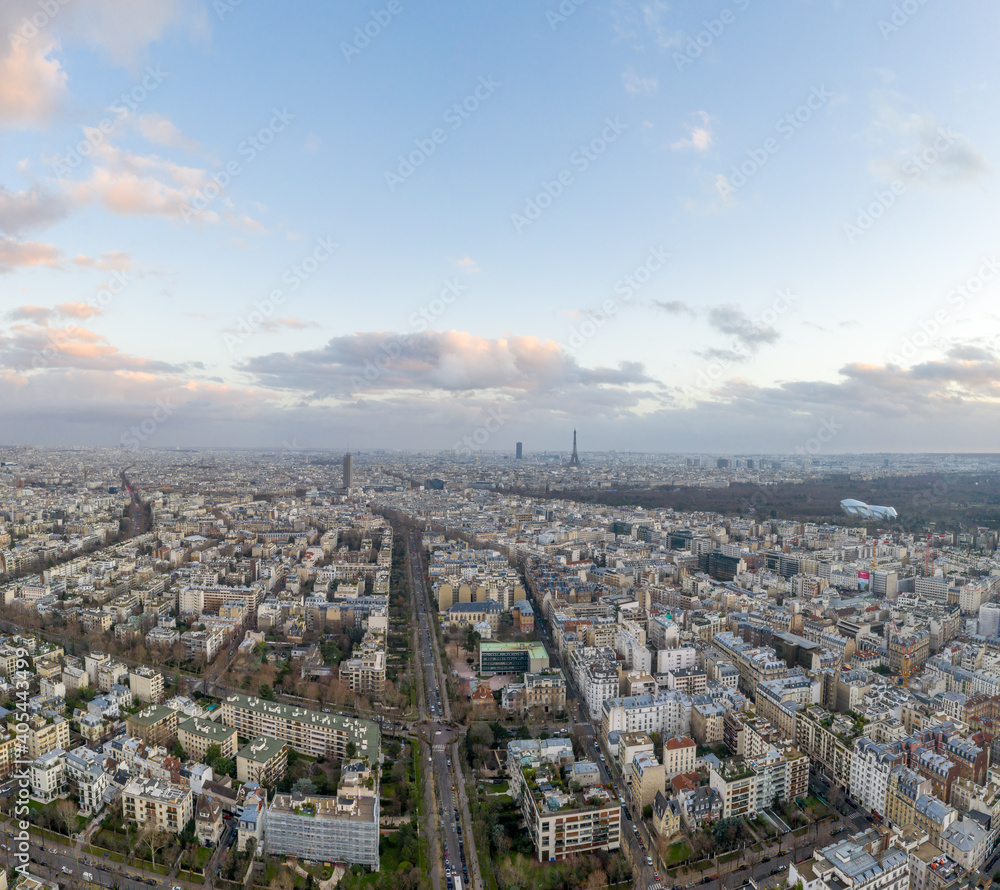 Aerial drone shot of Neuilly levallois in Paris with Eiffel tower and boulogne forests with clear sky Aerial drone shot of Neuilly levallois in Paris with Eiffel tower and boulogne forests with clear sky