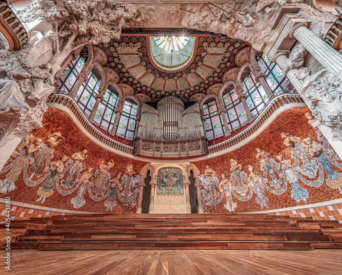 Barcelona, Spain - Feb 24, 2020: Sumptuous wooden stage with stone relief in Catalonia Music Hall