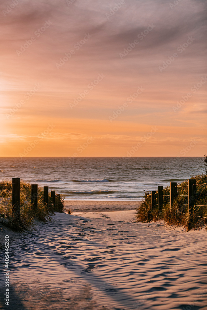 Fototapeta premium Sandy path the sunset on Grange Beach, South Australia