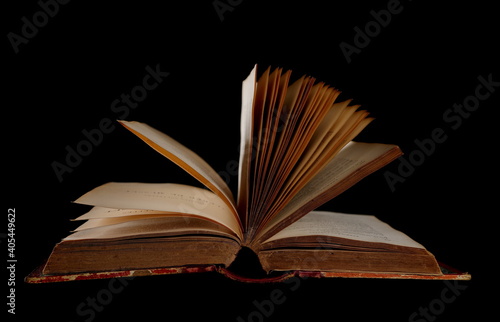 Old antique, ancient book isolated on black background with clipping path © dule964