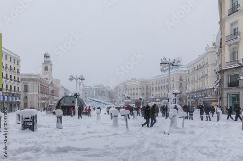 MADRID, SPAIN - JANUARY 09, 2021 - people enjoying the streets of snow, in the city of Madrid, covered by the storm philomena, january 05, 2021 in Madrid