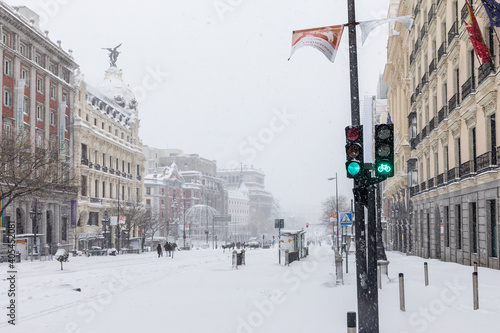 MADRID, SPAIN - JANUARY 09, 2021 - people enjoying the streets of snow, in the city of Madrid, covered by the storm philomena, january 05, 2021 in Madrid