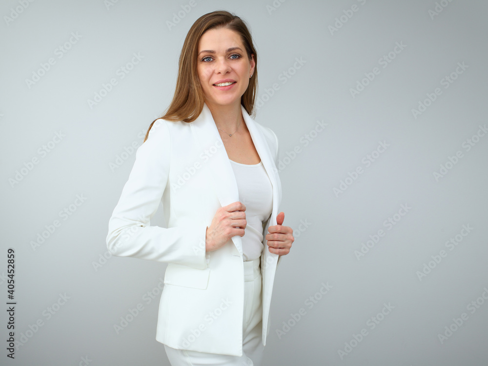 Smiling buisness woman in white suit. Smiling buisness woman in white suit.
