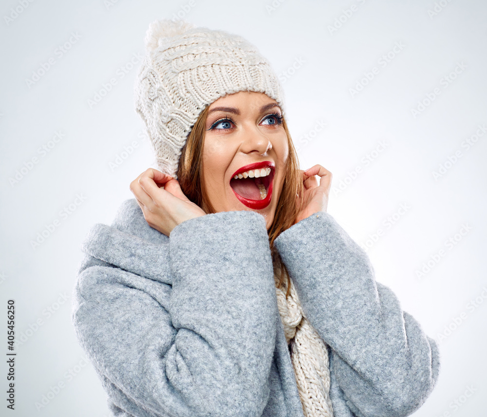 portrait of emotional surprising woman in winter coat. portrait of emotional surprising woman in winter coat.