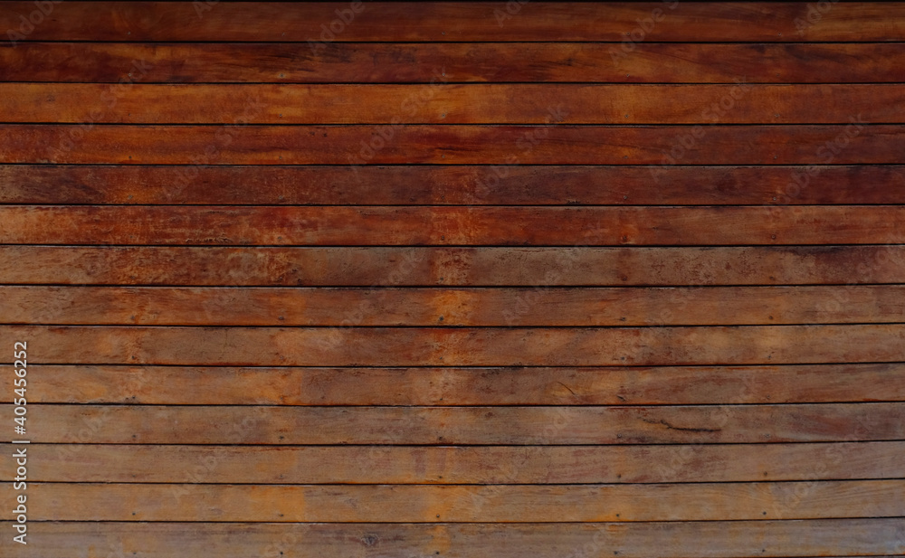 Natural Wooden background from old texture boards. Wooden rustic background. Copy space for your text or image. Top view. Dark brown wood boards. Blank for design and require a wood grain. Natural Wooden background from old texture boards. Wooden rustic background. Copy space for your text or image. Top view. Dark brown wood boards. Blank for design and require a wood grain.