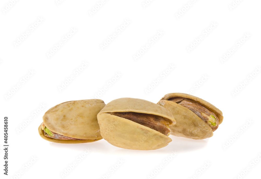 Pistachios isolated on white background close-up. Pistachios isolated on white background close-up.