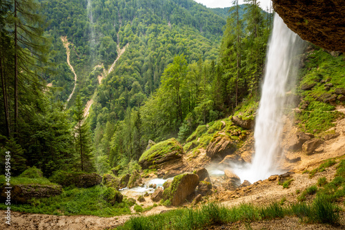 Long exposure of the Pericnik slap or Pericnik Fall, Triglav National Park, Slovenia. It is a big waterfall that falls from the cascade. photo