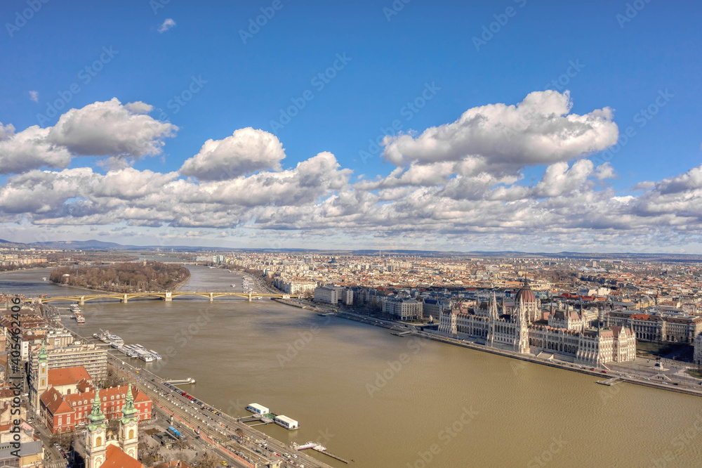 Aerial drone shot of Hungarian Parliament by Danube from Buda hill in Budapest winter noon