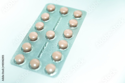 package of tablets on a white sheet of paper.