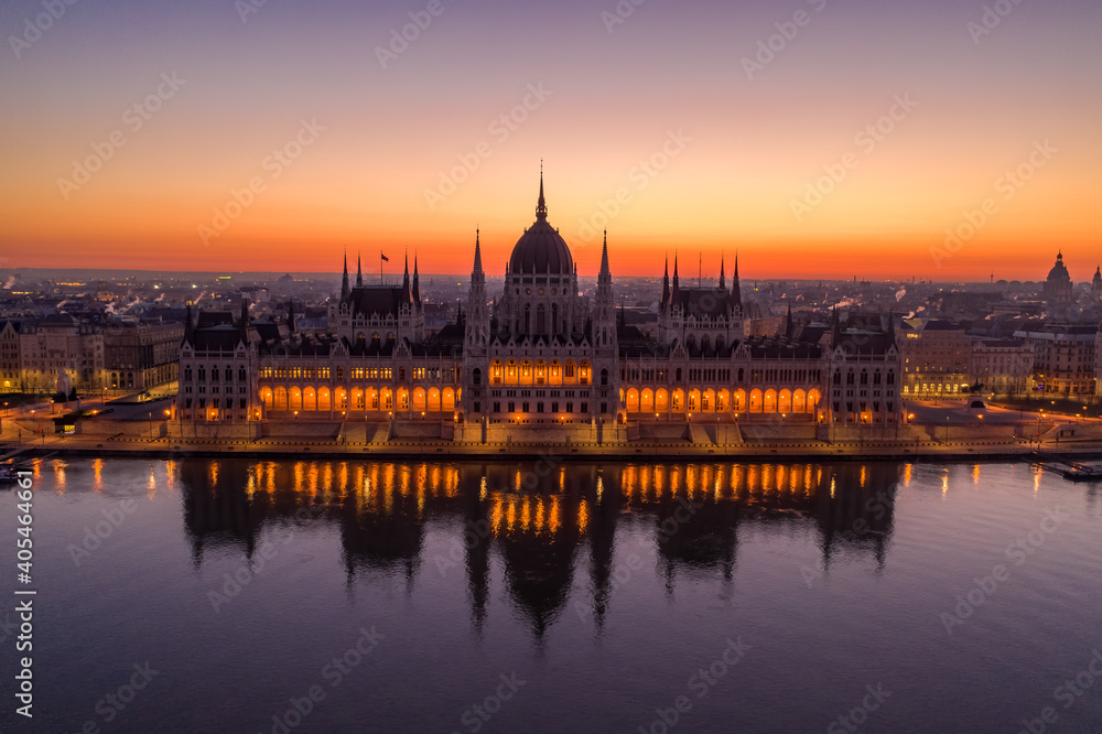 Fototapeta premium Aerial drone shot of Hungarian Parliament lights off before sunrise in Budapest dawn