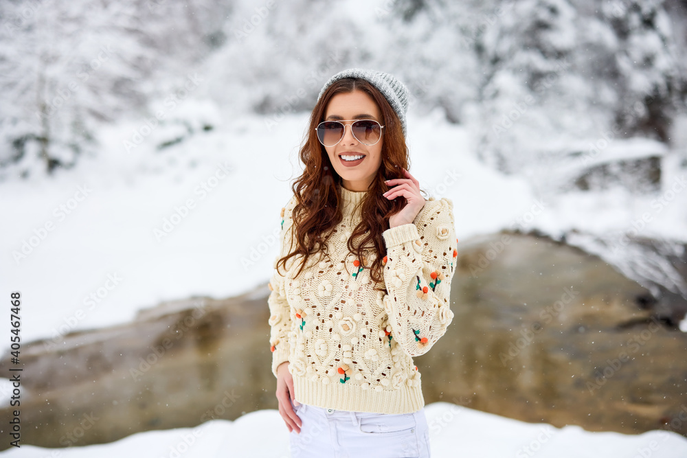 Attractive young woman in wintertime outdoor Attractive young woman in wintertime outdoor