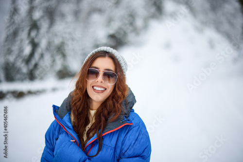 Attractive young woman in wintertime outdoor