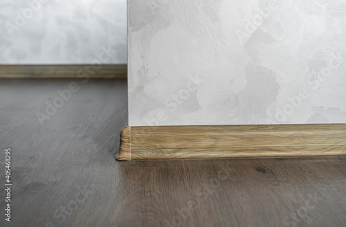 Konstfotografi Laminate with plastic baseboard with a wooden texture