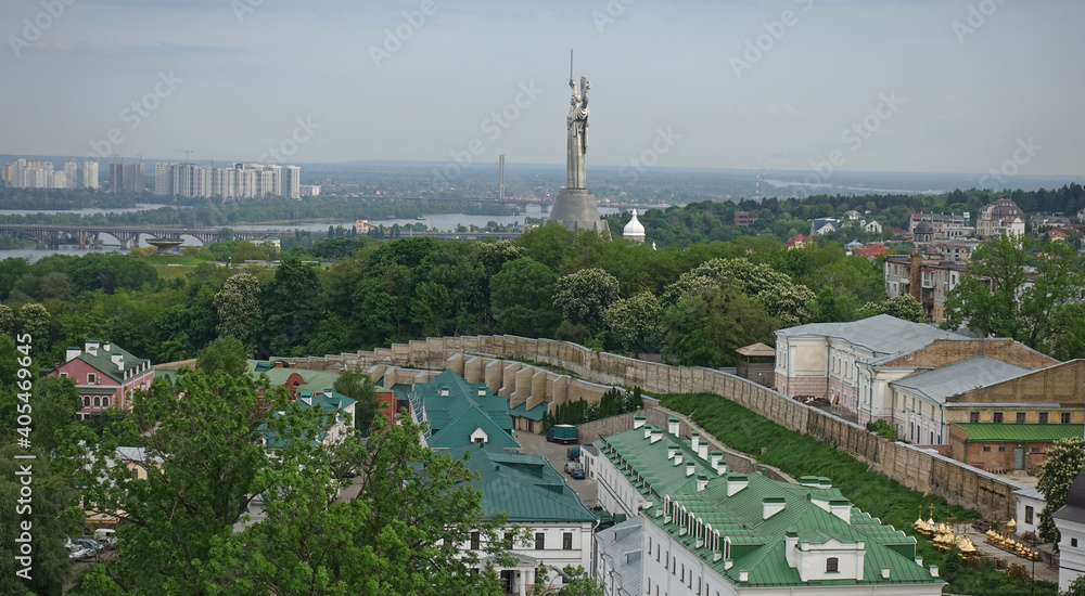 View of the architecture of Kiev and the Motherland monument on a summer day