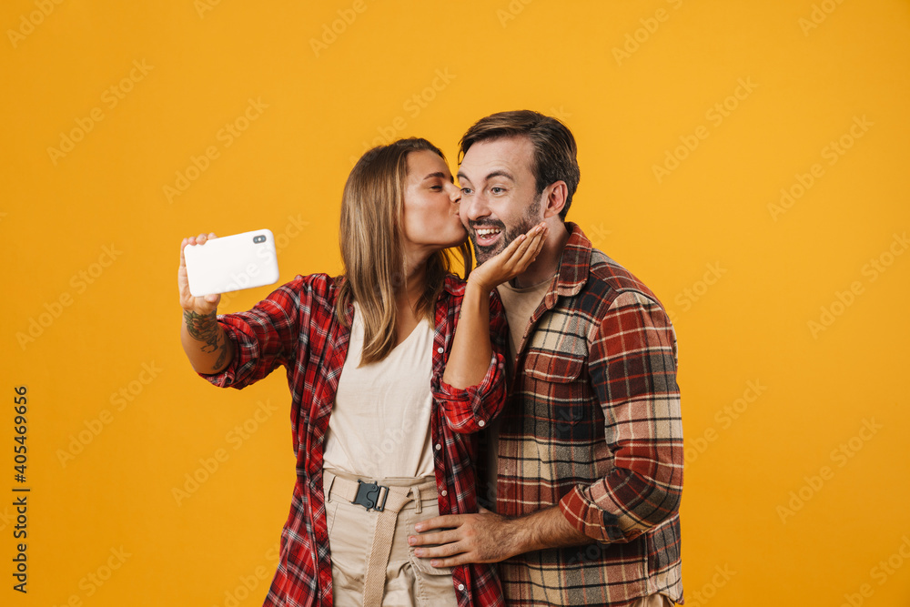 Portrait of a cheerful young couple hugging Portrait of a cheerful young couple hugging
