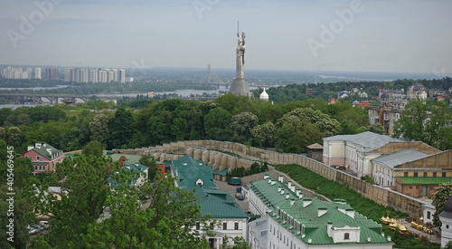 View of the architecture of Kiev and the Motherland monument on a summer day